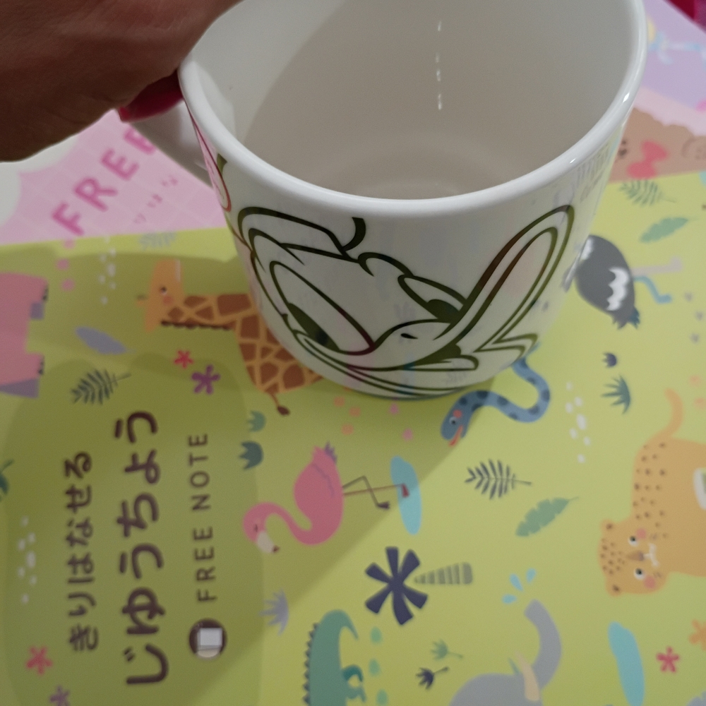 Disney White Mug with Green and Black Design